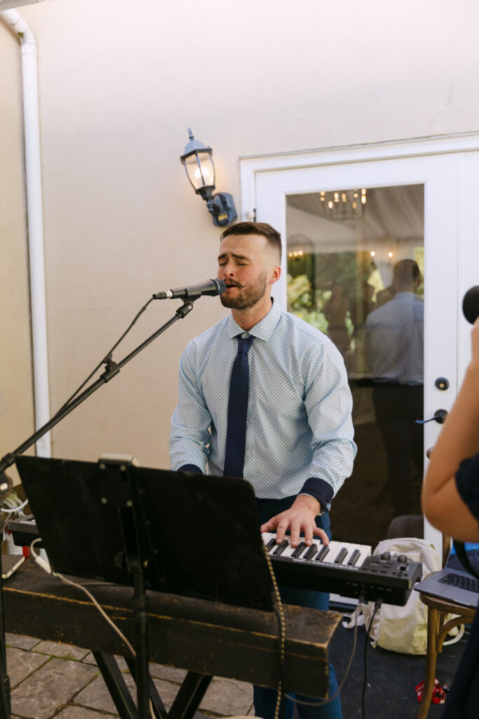 Man performing on a keyboard.