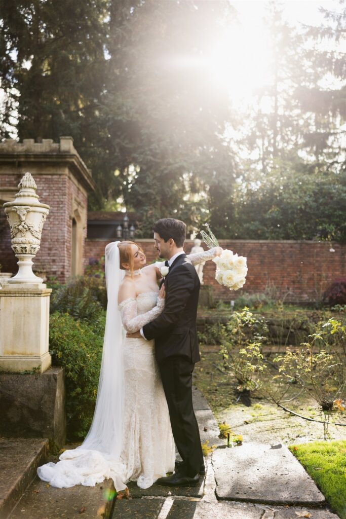 Golden hour bride and groom portrait in the Sunken Garden at Thornewood Castle in Lakewood, WA.