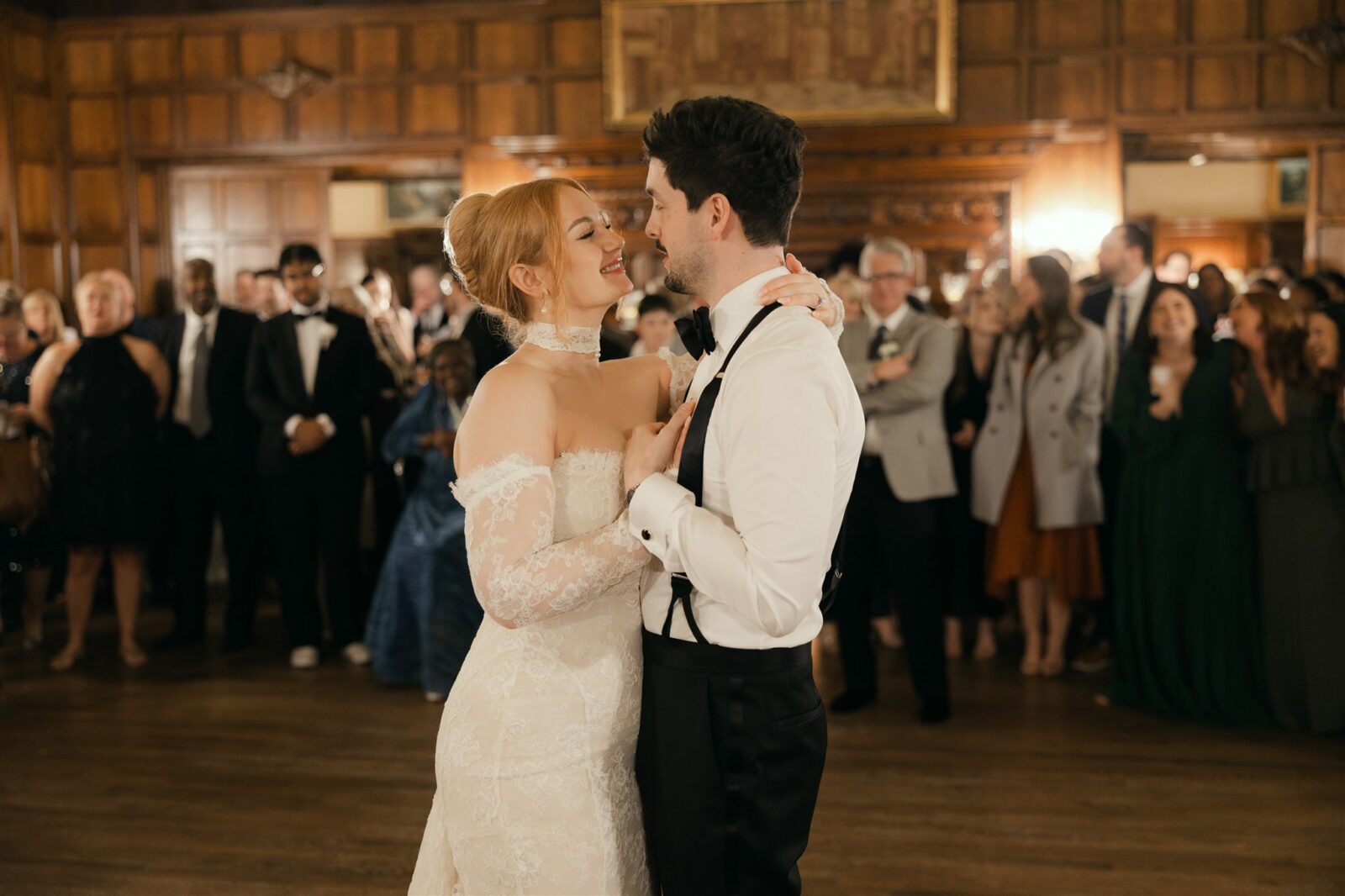 Bride and groom dancing during their Thornewood Castle wedding reception.