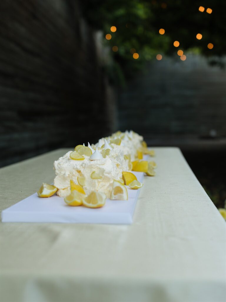 Lemon cake styled on a reception table. 