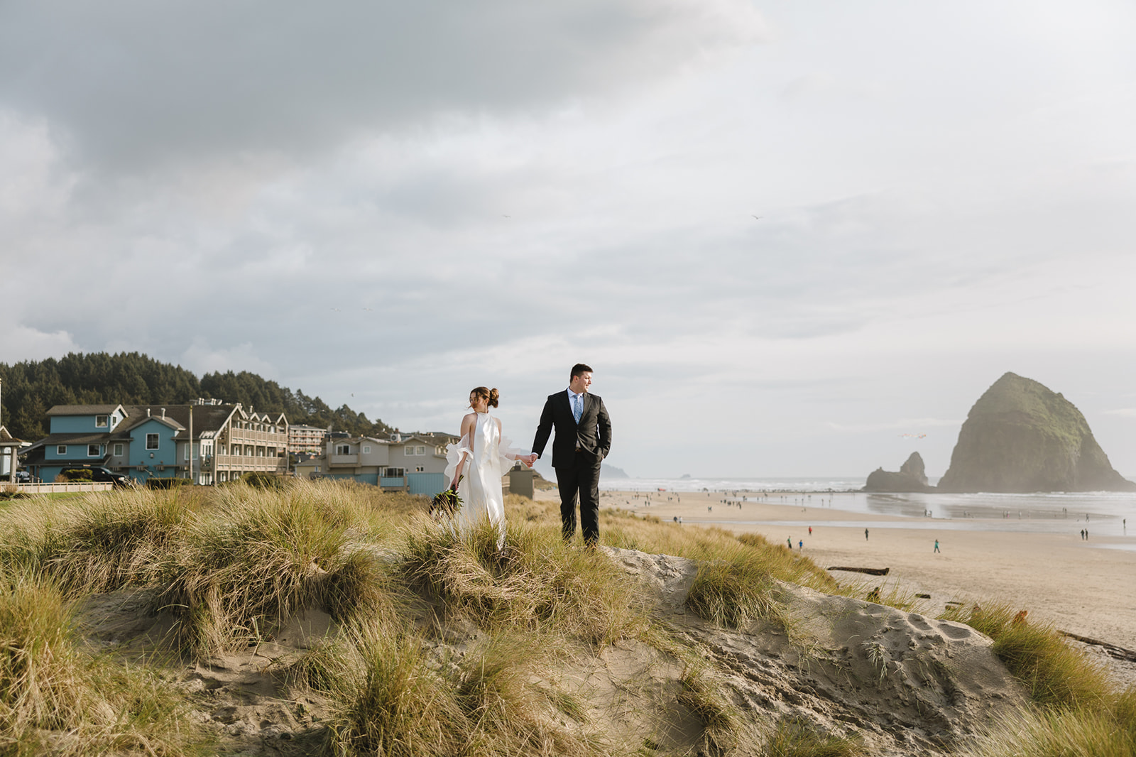 Editorial Cannon Beach elopement photos on sand dunes.