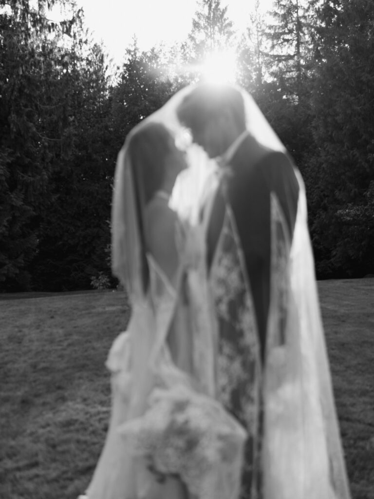 Black and white veil portrait of couple during whimsical wedding inspiration at Foxglove Lodge Vashon Island.