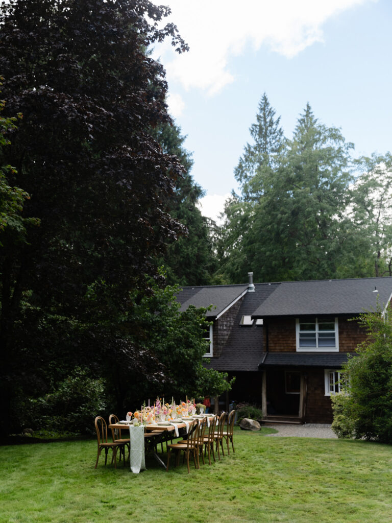 Outdoor reception table on the Arboretum Lawn at Foxglove Lodge Vashon.