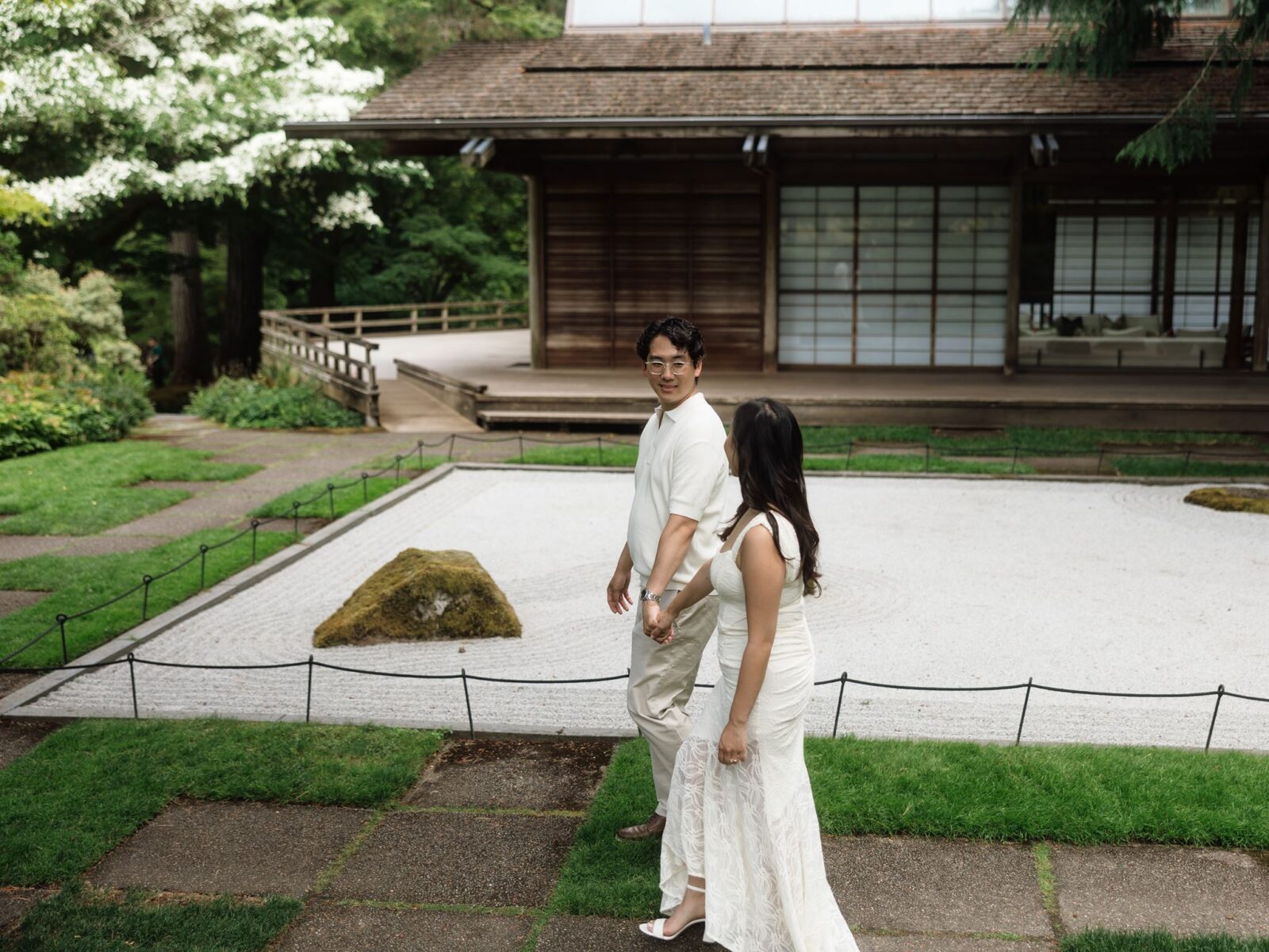 Couple walking a pathway together.