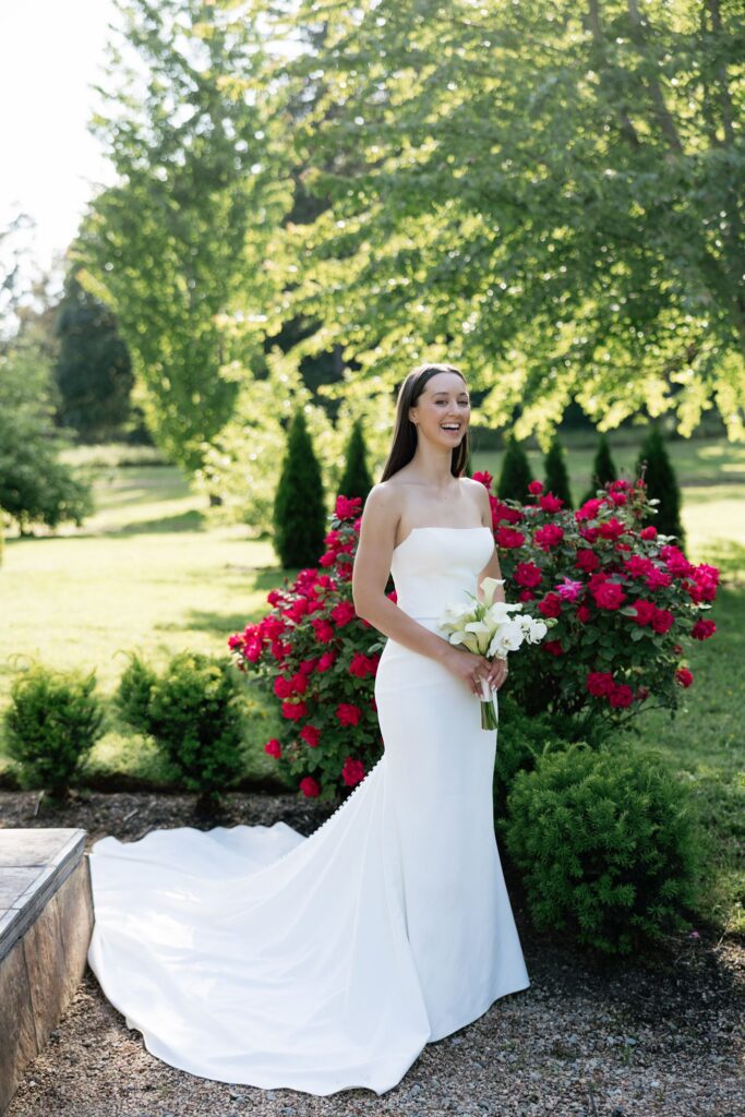 Bride laughing during her portraits in the gardens.