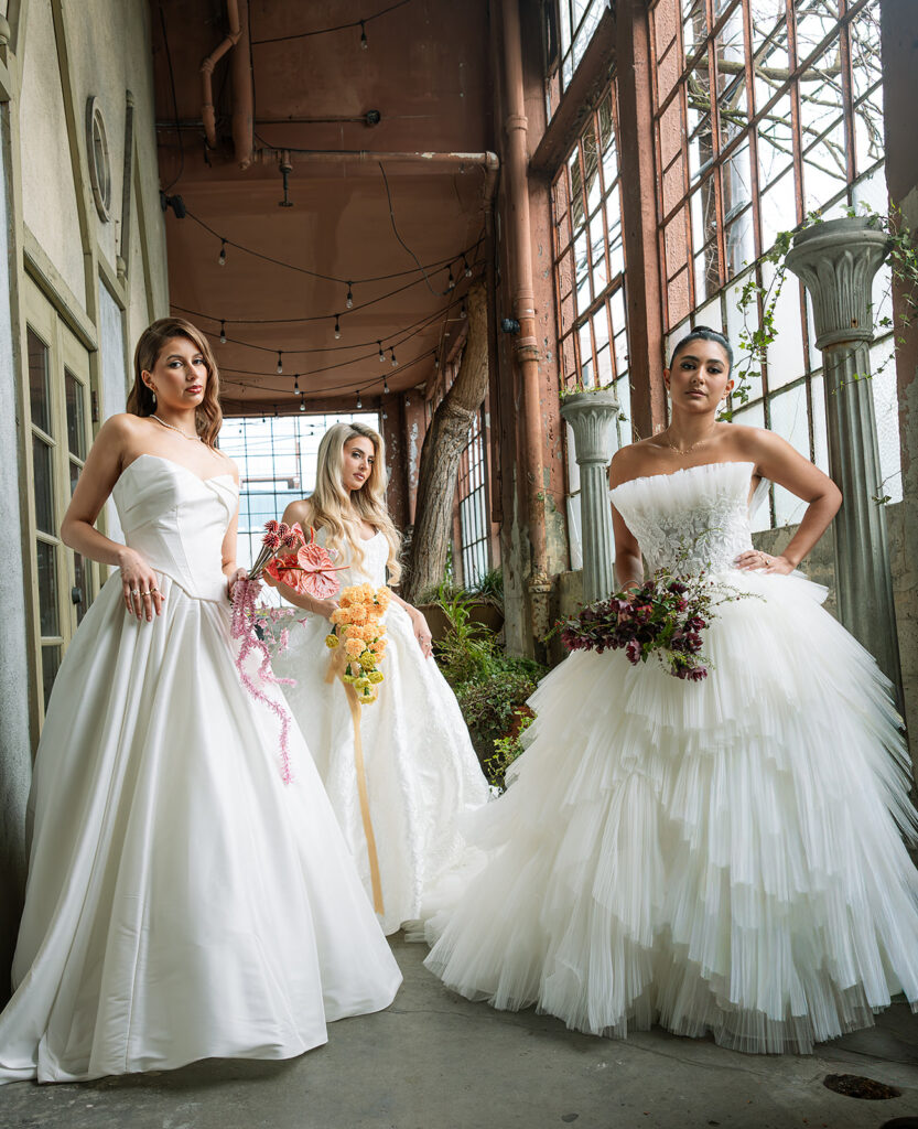Brides posing inside The Ruins in Seattle for a wedding editorial.